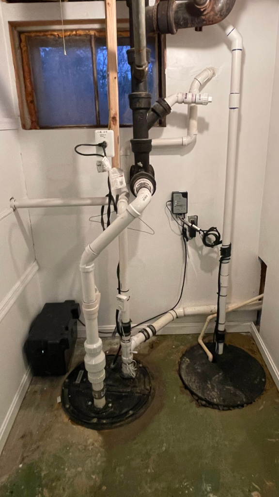 image of installation of sump pump with battery backup. 