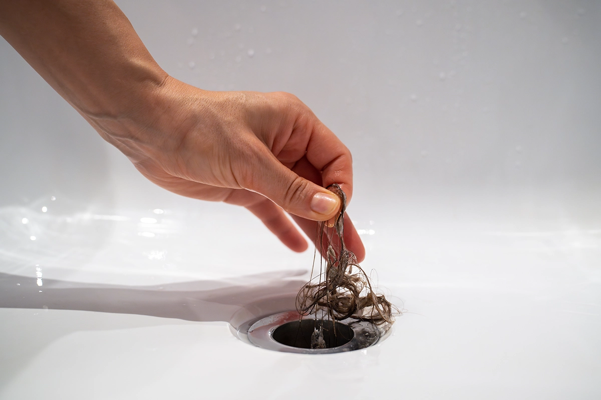 how to get hair out of shower drain