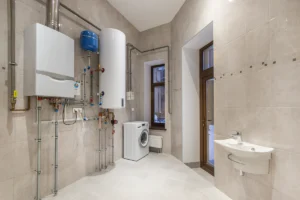 Tankless water heater and home plumbing setup showing how proper installation helps pump more GPM efficiently.