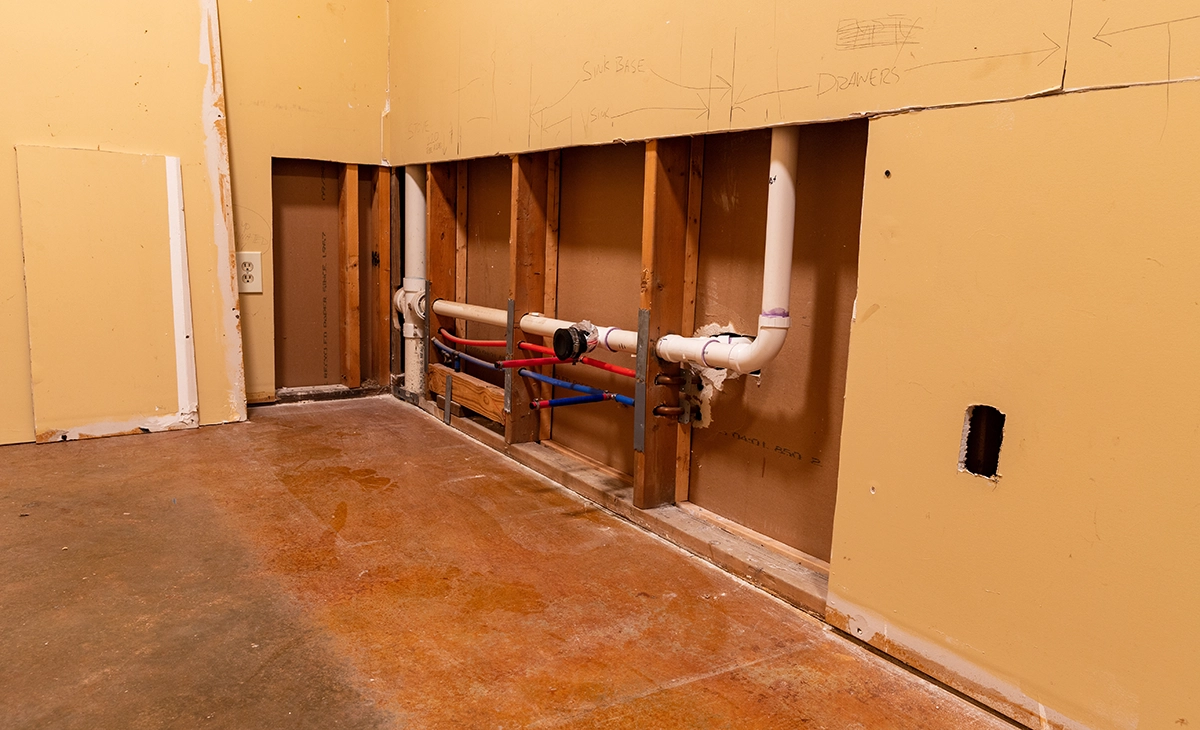 PEX plumbing supply lines installed behind a residential wall